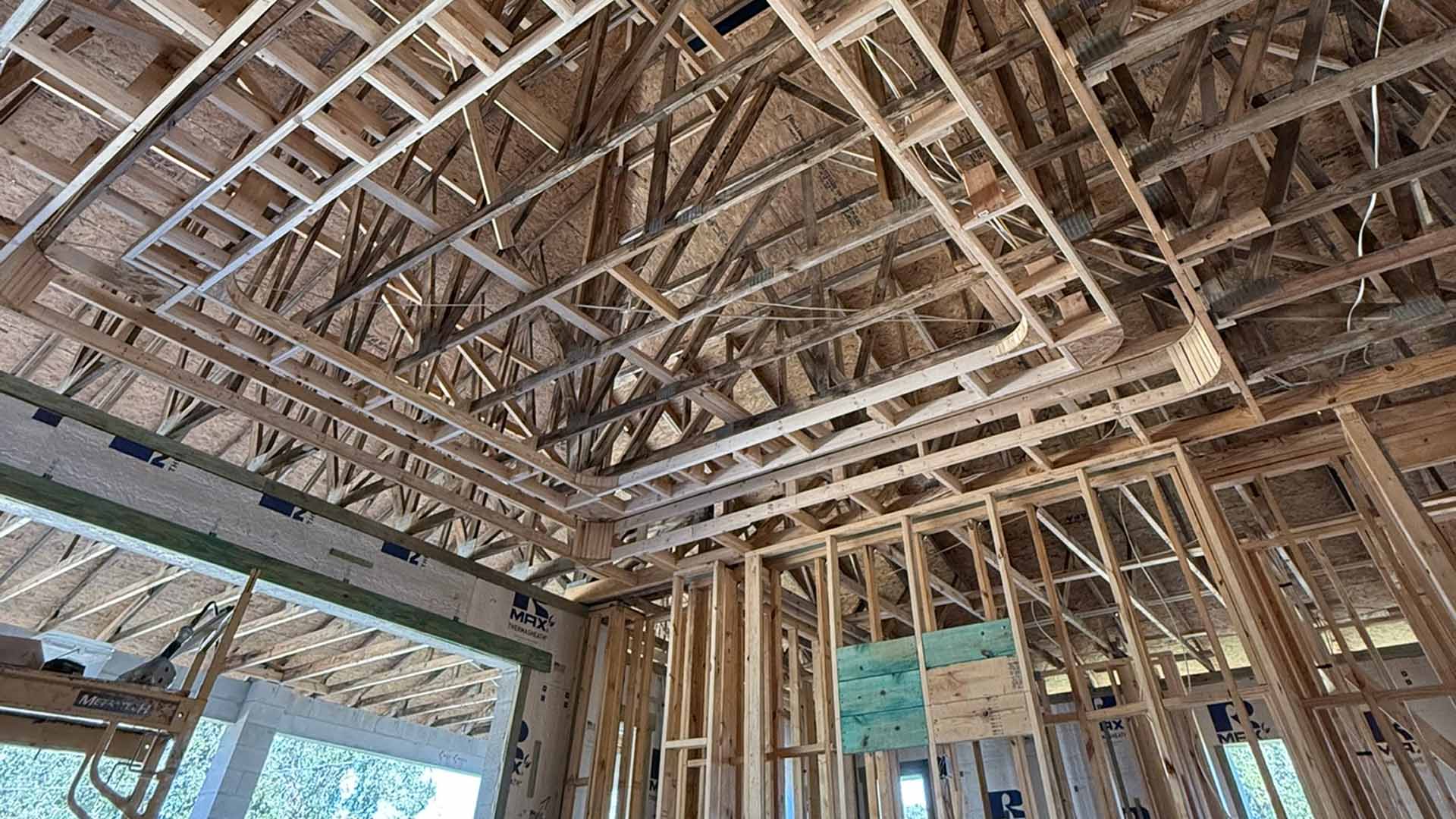 Custom home building process in Florida — framing and construction in progress