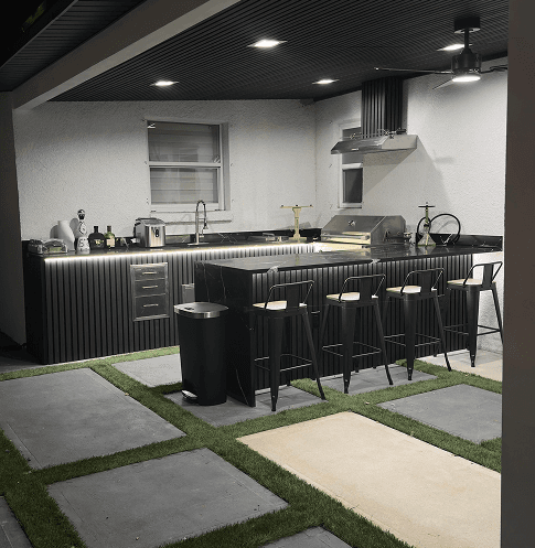 Outdoor kitchen construction in Tampa Bay — built-in grill and countertop
