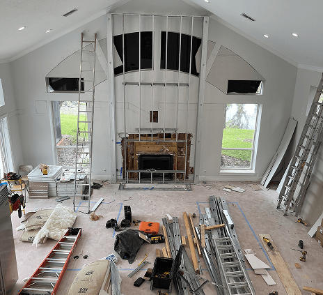 Signs of hidden water damage in a Florida home — ceiling stain and wall damage